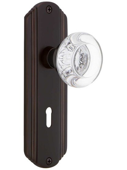 Streamline Moderne Mortise Lock Set with Round Crystal Glass Knobs with Keyhole in Timeless Bronze.